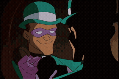 A Cartoon Character Wearing A Green Hat And A Purple Mask With The Letter C On It GIF