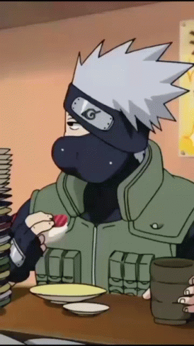 A Cartoon Character Wearing A Mask And A Headband With The Letter G On It Is Eating Food . GIF