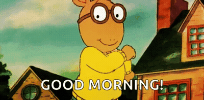 A Cartoon Character Wearing Glasses And A Yellow Shirt Says Good Morning . GIF