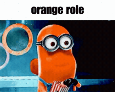 A Cartoon Character Wearing Glasses And Holding A Bag Of Popcorn With The Words `` Orange Role '' Written On It . GIF
