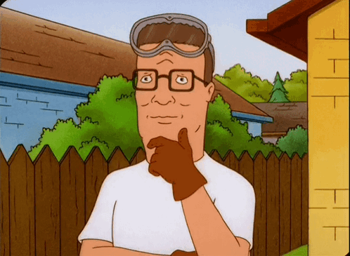 A Cartoon Character Wearing Goggles And A Glove Holds His Hand To His Chin GIF