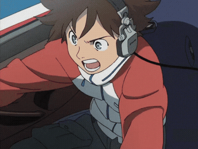 A Cartoon Character Wearing Headphones And A Red Jacket With The Letter T On His Chest GIF