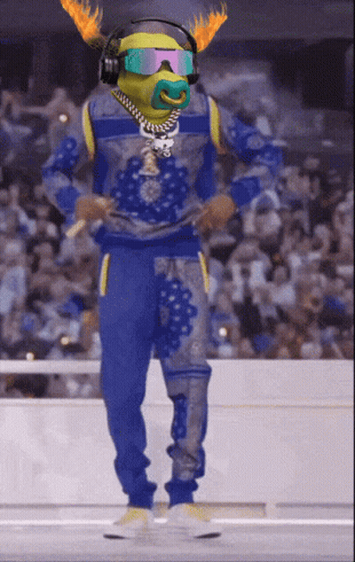 A Cartoon Character Wearing Headphones And Goggles With Flames On His Head GIF