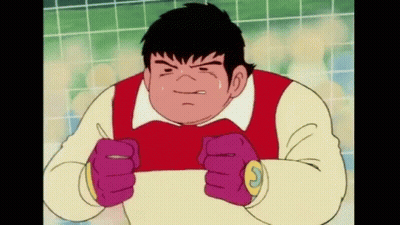 A Cartoon Character Wearing Purple Gloves And A Red Vest GIF
