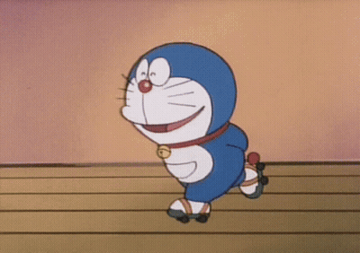A Cartoon Character Wearing Roller Skates Is Smiling GIF