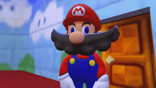 A Cartoon Character With A Beard And A Red Hat With A M On It GIF
