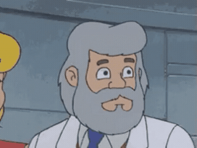 A Cartoon Character With A Beard And A White Coat Is Looking At The Camera . GIF