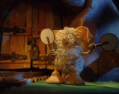 A Cartoon Character With A Beard Is Holding A Mirror And An Axe GIF