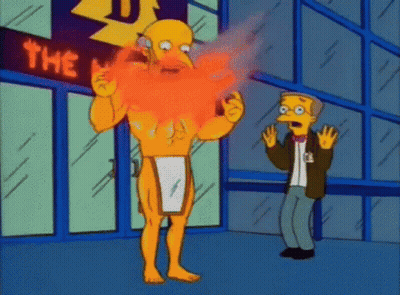 A Cartoon Character With A Beard Is Standing In Front Of A Sign That Says The GIF