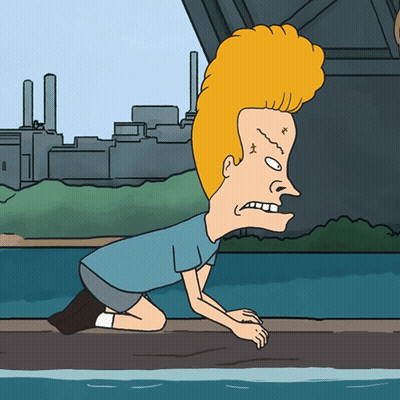 A Cartoon Character With A Big Head Is Kneeling Down GIF