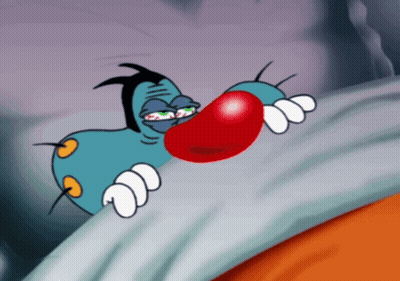 A Cartoon Character With A Big Red Nose Is Laying In Bed GIF