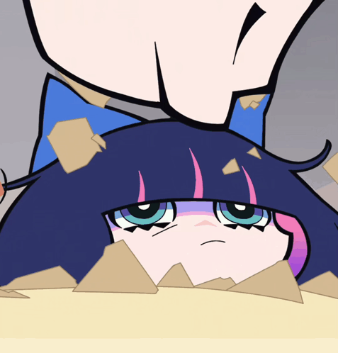 A Cartoon Character With A Blue Bow On Her Head Is Laying In The Sand GIF