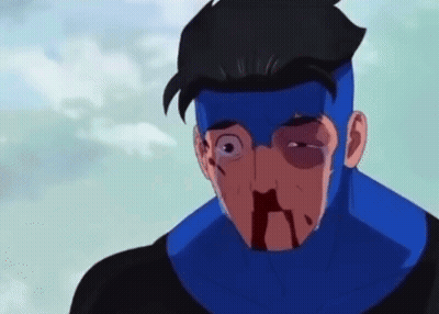 A Cartoon Character With A Blue Mask On His Face Is Bleeding From His Nose . GIF