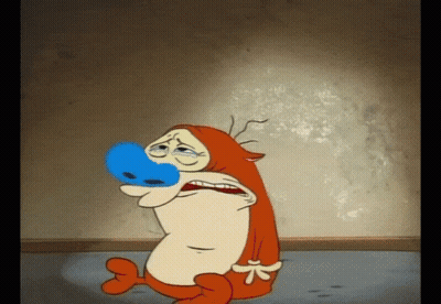 A Cartoon Character With A Blue Nose Is Crying In A Dark Room GIF