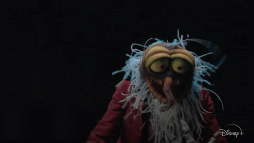 A Cartoon Character With A Disney Logo In The Background GIF