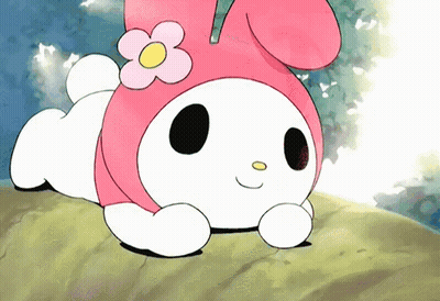 A Cartoon Character With A Flower On Her Head Is Laying Down GIF