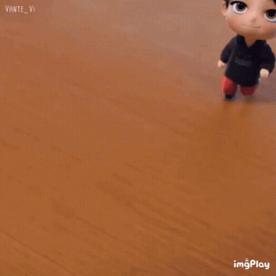 A Cartoon Character With A Headband On His Head Is Standing On A Wooden Floor .. GIF