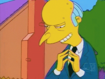 A Cartoon Character With A Long Nose Is Wearing A Blue Suit GIF