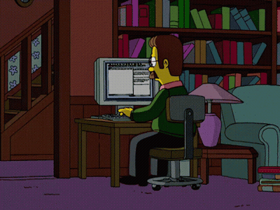 A Cartoon Character With A Mustache And Glasses Is Looking At A Computer Monitor GIF