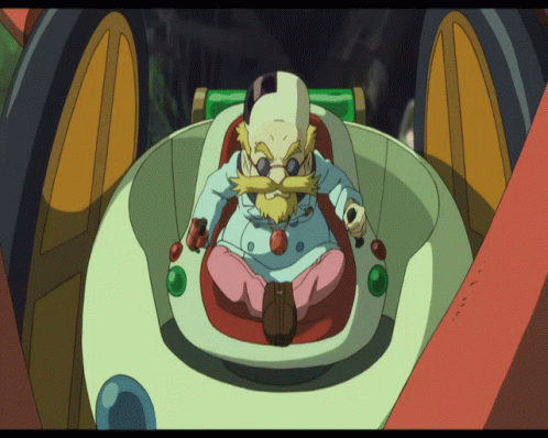 A Cartoon Character With A Mustache And Glasses Is Sitting In A Vehicle GIF