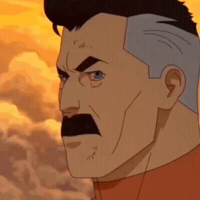 A Cartoon Character With A Mustache And Gray Hair Is Looking At The Camera . GIF