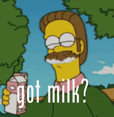 A Cartoon Character With A Mustache Is Holding A Carton Of Milk And The Words Got Milk Below Him GIF