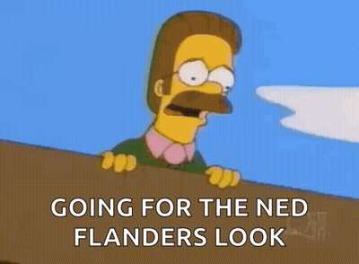 A Cartoon Character With A Mustache Says Going For The Ned Flanders Look . GIF