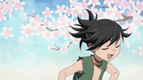 A Cartoon Character With A Ponytail Is Standing In Front Of A Tree With Pink Flowers GIF