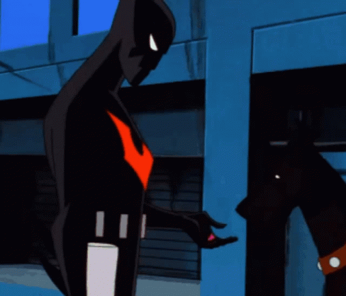 A Cartoon Character With A Red Arrow On His Chest Is Standing In Front Of A Building GIF