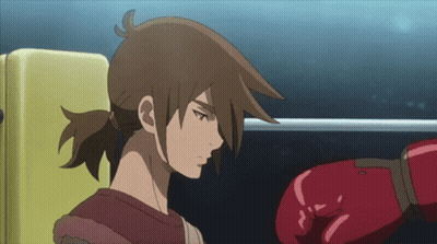 A Cartoon Character With A Red Boxing Glove On His Hand GIF