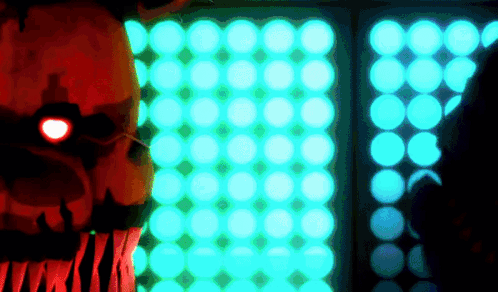 A Cartoon Character With A Red Eye Stands In Front Of A Wall Of Blue Lights GIF
