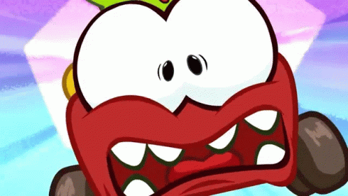 A Cartoon Character With A Red Face And A Green Crown GIF