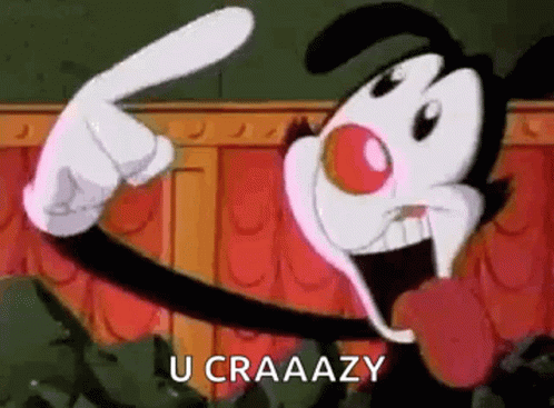 A Cartoon Character With A Red Nose Is Pointing At Something With His Finger . GIF
