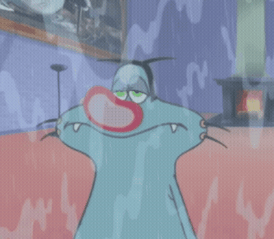 A Cartoon Character With A Red Nose Is Standing In A Room GIF