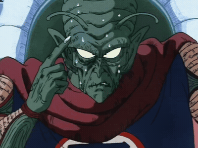 A Cartoon Character With A Red Scarf Around His Neck Has The Letter S On His Shirt GIF