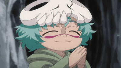 A Cartoon Character With A Skull On Her Head Is Smiling GIF