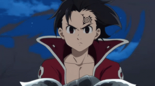 A Cartoon Character With A Swirl Tattoo On His Face GIF
