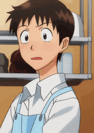 A Cartoon Character With A White Shirt And Blue Apron Making A Funny Face GIF