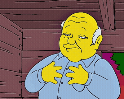 A Cartoon Character With A Yellow Face And A Blue Shirt Has His Hands On His Chest GIF