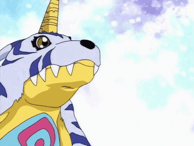 A Cartoon Character With A Yellow Head And Tentacles Is Smiling . GIF