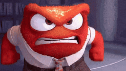 A Cartoon Character With An Angry Face Is Wearing A Tie And A Shirt . GIF