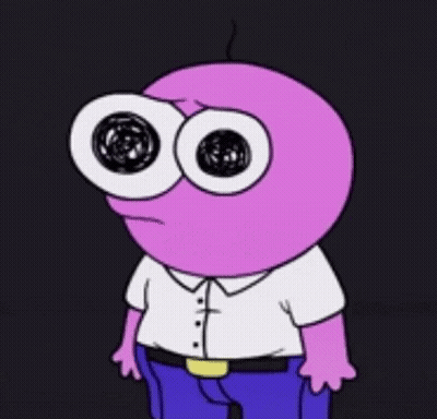 A Cartoon Character With Big Eyes And A White Shirt Is Standing In The Dark . GIF