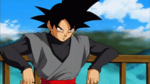A Cartoon Character With Black Hair Is Standing On A Balcony With His Hands On His Hips GIF