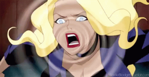 A Cartoon Character With Blonde Hair And Blue Eyes Is Screaming With Her Mouth Wide Open . GIF