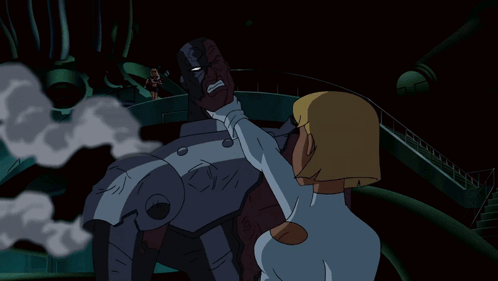 A Cartoon Character With Blonde Hair And Blue Eyes Is Wearing A White Suit GIF