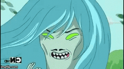 A Cartoon Character With Blue Hair And Green Eyes Is Making An Ok Sign GIF