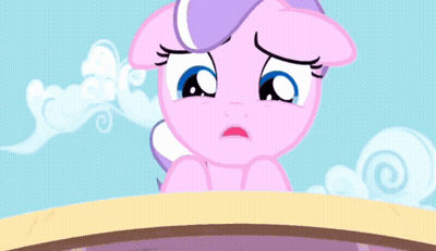 A Cartoon Character With Bubbles Around Her Eyes GIF