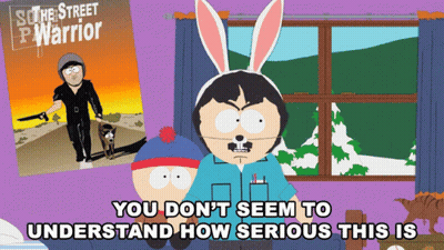A Cartoon Character With Bunny Ears Is Standing In Front Of A Poster For South Street P Warrior GIF