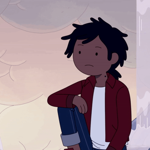 A Cartoon Character With Dreadlocks Is Sitting Down GIF