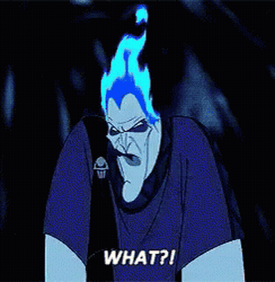A Cartoon Character With Flames Coming Out Of His Mouth Says " What " GIF
